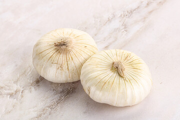 Raw white onion heap isolated