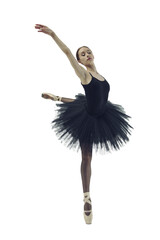 ballerina in a black tutu shows elements of ballet dance in motion, isolated on transparent...