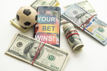 tablet pc with app for sport bets, on top of stacks of banknotes, white background, concept of online bets 3d render