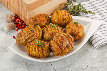 Baked baby potato with thyme