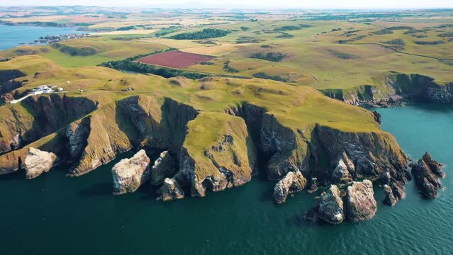 The Rugged Cliffside Beauty and Majestic Coastline of St Abbs Head Aerial View, Scotland, United Kingdom.