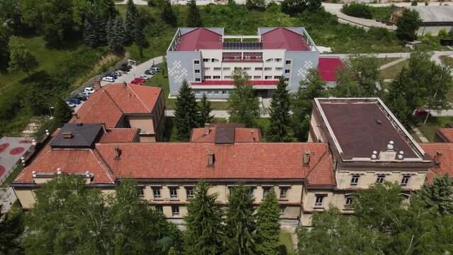Uzice, Serbia. Aerial View of Old Military Building in Krcagovo Neighborhood, Revealing Drone Shot