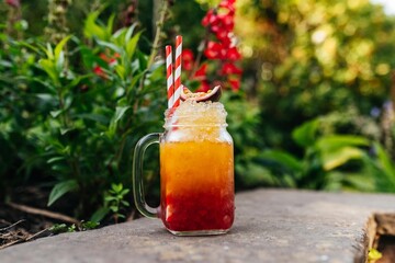 Passion Fruit Mocktail in a Garden: Refreshing Non-Alcoholic Beverage Surrounded by Lush Greenery and Vibrant Flora