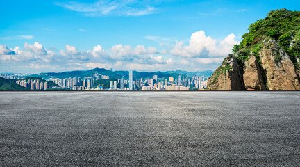 Asphalt road square and mountain with city skyline in Shenzhen. panoramic view.