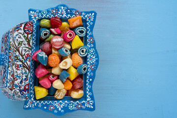 Colorful Candy and Chocolate in the Blue Background Photo, Ramadan Kareem Concept Photo, Üsküdar...