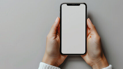 A beautiful hand displaying a modern smartphone with a blank white screen, isolated on a clean, white background for a minimalistic design..