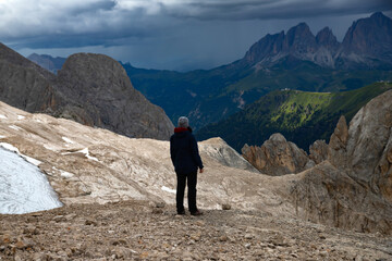 Mountain view with climber, Marmolada, mountain, Dolomites, Italy. - 775640521
