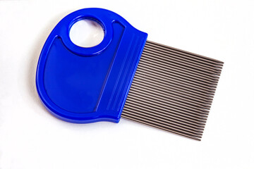 Hair lice comb, for removing nits with blue handle and small magnifying glass. isolated on white