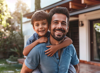 A happy Latin father giving piggyback ride to son outside home - Powered by Adobe