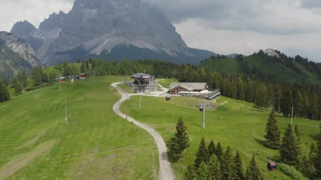 Mountain Gondola lifts bring summer tourist to scenic Col dei Baldi, Dolomite grandeur