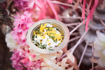 The tepung tawar ritual is adapted from the Hindu ritual that has already been embraced in...