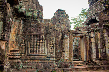 Naklejka premium The main gate and beautiful ancient carving of Banteay Kdei in Siem Reap, Cambodia