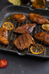 grilled pieces of Organic Tuna Steak on a grill frying pan