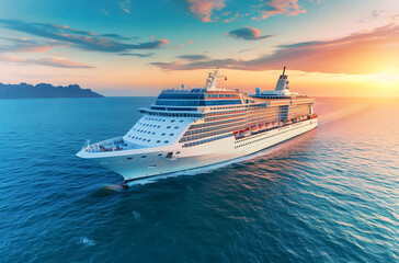 A luxury cruise ship sailing on the ocean at sunset, showcasing its large exterior and modern design with vibrant colors of blue sky and turquoise water.