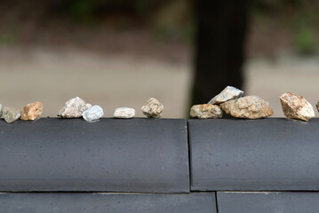 View of the stacked pebbles on the wall roof