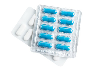 Various medicine capsules, pills and tablets in a blister pack isolated on white background,...