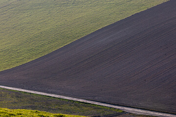 A full frame abstract photograph looking down at agricultual fields