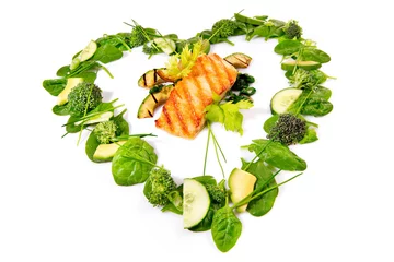  Heart Shape green Salad and Vegetables with Grilled Salmon isolated on white Background © ExQuisine