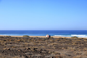 November 19 2023 - Playa de Cofete, Jandia, Fuerteventura, Canary Islands, Spain: people enjoy the freedom at the atlantic ocean on a sunny day