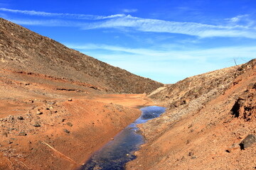 Fototapeta na wymiar Embalse de los Molinos, Fuerteventura, Canary Islands: the outlet area of the old reservoir