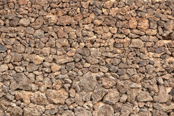 antique brown natural stone wall texture for background