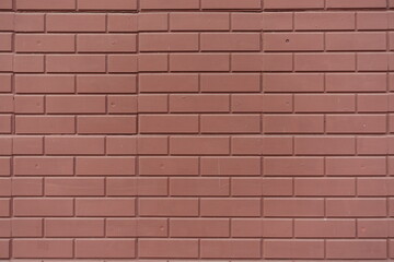 Obraz premium Background - reddish brown painted brick veneer wall