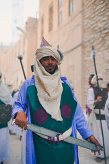 Ramadan atmosphere. People wearing traditional historical costumes during Ramadan celebrations. Historical Islamic clothing. 