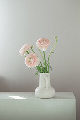 spring flowers in vase in white modern interior - obrazy, fototapety, plakaty