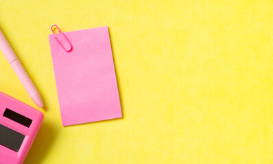 sticky notes with pin. copy space on yellow colour background. shot with high angle view