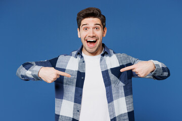 Young shocked excited overjoyed Caucasian man he wear shirt white t-shirt casual clothes point...