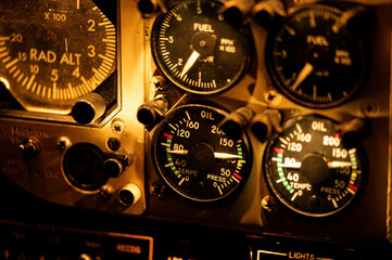 Oil temperature and pressure gauge in aircraft cockpit