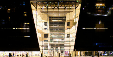 Night detail of contemporary facade shows an example of Scandinavian architecture in Copenhagen....