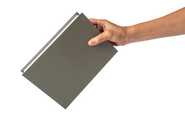 Blank grey book cover in hand on transparent background.