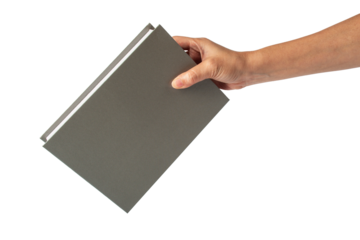 Blank grey book cover in hand on transparent background.