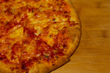 Italian Margherita pizza on a wooden board