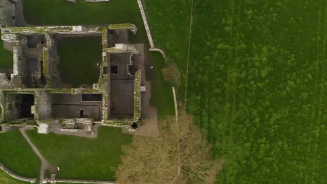 Aerial top down pans across Bective Abbey. Dramatic perspective. Co Meath, Ireland