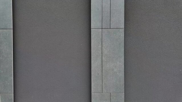 Grey wall background. Abstract architecture parts of a commercial building as a background. Slow motion
