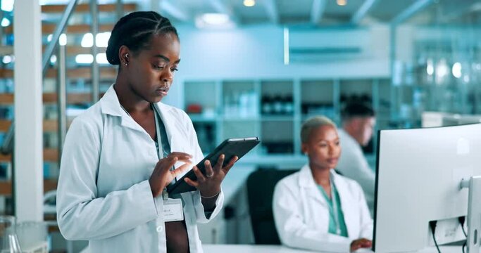 Black woman, lab and scientist with tablet for results or research as healthcare worker. Female person, hospital and browse website for information or treatment guidelines, medical and schedule