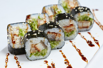 tasty sushi on the white - 775791108