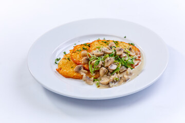 potato pancakes  with mushrooms on white plate - 775793719