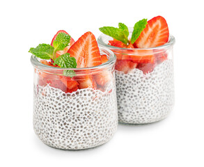 Homemade sweet vegetarian chia pudding healthy dessert made with seeds soaked in alternative milk decorated with sliced juicy strawberry topping and fresh mint leaf in glass jar isolated on white