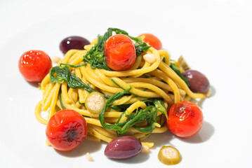  Agretti pasta spaghetti. Barba di frate or Saltwort or Salsola Soda, olives, anchovy, tomatoes, capers,  pine nuts and olive oil, spring Italian recipes, spring Easter recipes - 775804978