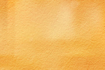 Decorative wall with orange cement. Yellow brown concrete wall texture for abstract background and...