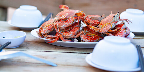 freshly prepared crabs on table