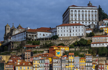 View from Vila Nova de Gaia city on buildings in Ribeira area and Bishops Palace in Porto, Portugal