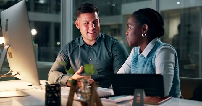 Team, talking and computer at night in office, collaboration and online research for creative project. Employees, diversity and communication as journalist by desk and editing a article for company
