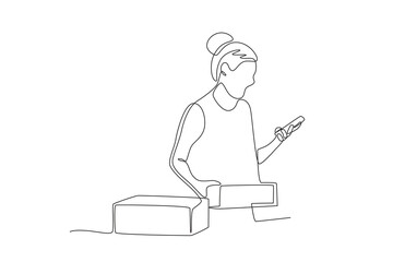 The business owner is looking at a packaged order.Business small one-line drawing