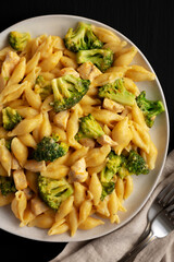 Homemade Cheesy Chicken And Broccoli Pasta on a Plate, top view. Close-up.