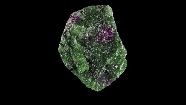 Anyolite - Green Zoisite with Ruby (from Tanzania) rotating slowly against a black background.