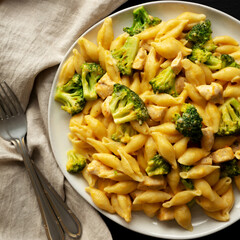 Homemade Cheesy Chicken And Broccoli Pasta on a Plate, top view.
